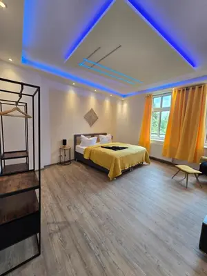 Ein Bett oder Betten in einem Zimmer der Unterkunft Stilvoll zu Hause mit Charme, bis zu 6 Personen