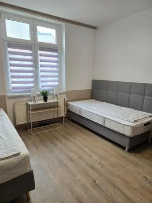 Ein Bett oder Betten in einem Zimmer der Unterkunft FeWo 5 Personen, Nähe Bahnhof