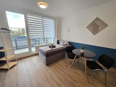 Ein Sitzbereich in der Unterkunft FeWo 5 Personen, Nähe Bahnhof, WLAN,Balkon