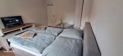 Ein Bett oder Betten in einem Zimmer der Unterkunft MaiFerien Harz - Haus Goldstrahl