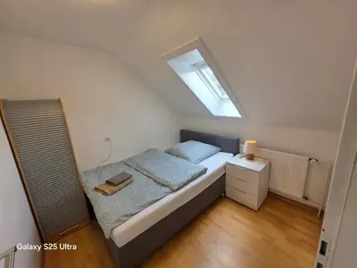 Ein Bett oder Betten in einem Zimmer der Unterkunft MaiFerien Harz - Haus Goldstrahl