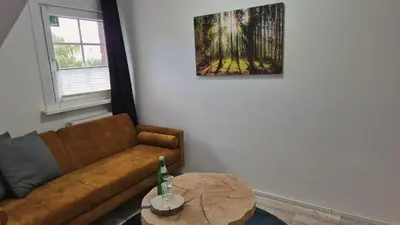 Ein Sitzbereich in der Unterkunft Harzlodge Hilly