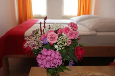 Ein Bett oder Betten in einem Zimmer der Unterkunft Ferienwohnungen Altstadtidylle 1