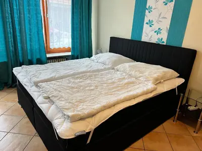 Ein Bett oder Betten in einem Zimmer der Unterkunft Gruppenhaus bis 14 Personen im Südharz