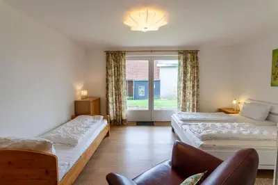 Ein Bett oder Betten in einem Zimmer der Unterkunft Ferienwohnung Rose