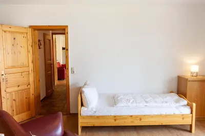 Ein Bett oder Betten in einem Zimmer der Unterkunft Ferienwohnung Rose