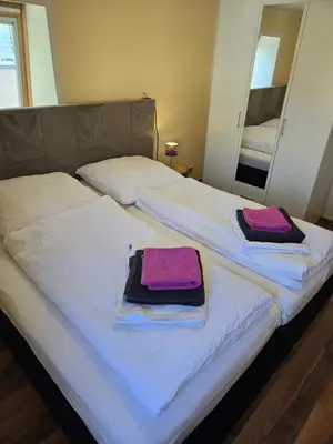 Ein Bett oder Betten in einem Zimmer der Unterkunft Ferienwohnung Mila