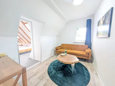 Ein Sitzbereich in der Unterkunft Gruppenhaus Rosenhof