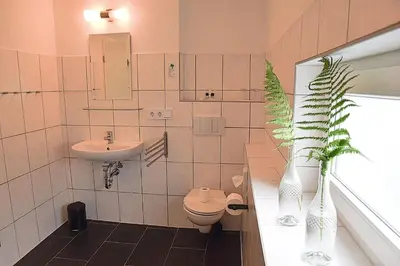 Ein Badezimmer in der Unterkunft Gruppenhaus Rosenhof