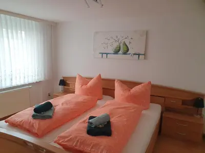 Ein Bett oder Betten in einem Zimmer der Unterkunft Harznester Schierke