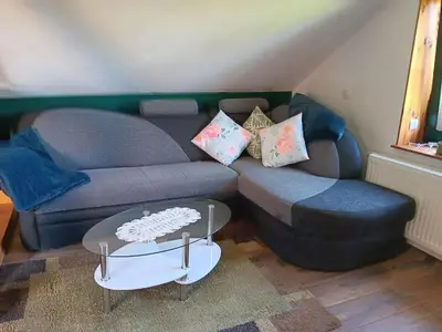 Ein Sitzbereich in der Unterkunft Ferienwohnung Harzteufel