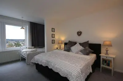 Ein Bett oder Betten in einem Zimmer der Unterkunft Ferienwohnung Hüttebergblick