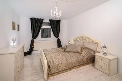 Ein Bett oder Betten in einem Zimmer der Unterkunft Ferienwohnungen Traumschloss
