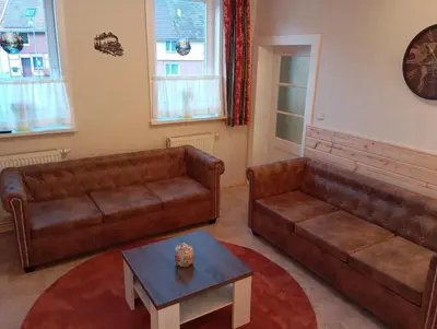 Ein Sitzbereich in der Unterkunft Ferienhaus Max Schmeling