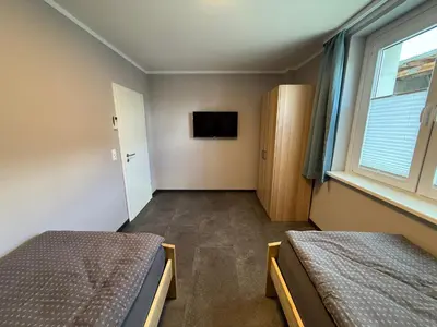 Ein Bett oder Betten in einem Zimmer der Unterkunft Monteurzimmer Goslar