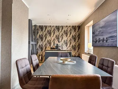 Ein Sitzbereich in der Unterkunft WILD&COZY Ferienhaus mit luxuriöser Küche & Garage