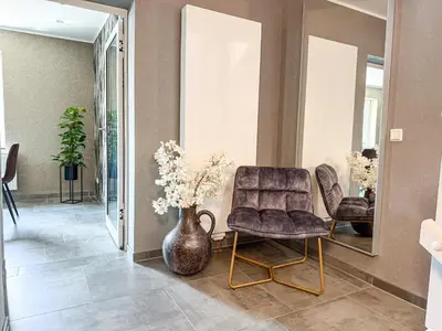 Ein Sitzbereich in der Unterkunft WILD&COZY Ferienhaus mit luxuriöser Küche & Garage