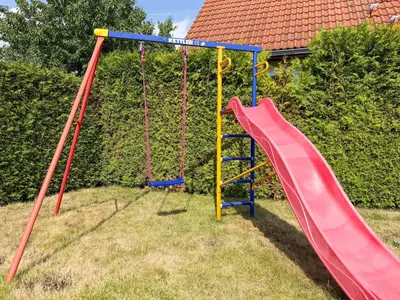 Ein Kinderspielbereich in der Unterkunft WILD&COZY Ferienhaus mit luxuriöser Küche & Garage
