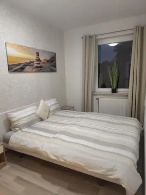 Ein Bett oder Betten in einem Zimmer der Unterkunft FeWo im Harz Bad Harzburg