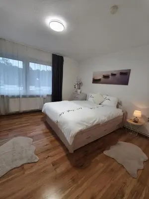 Ein Bett oder Betten in einem Zimmer der Unterkunft FeWo im Harz Bad Harzburg