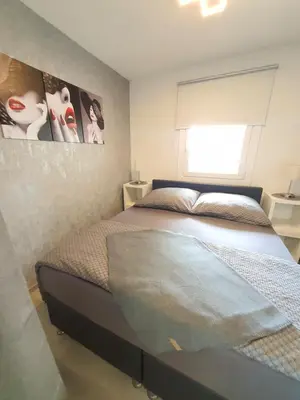 Ein Bett oder Betten in einem Zimmer der Unterkunft Ferienwohnung Auszeit-Wiesenblick