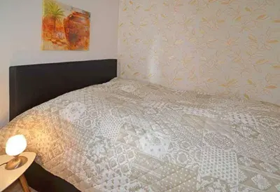 Ein Bett oder Betten in einem Zimmer der Unterkunft Fewo Jola