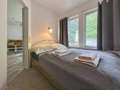 Ein Bett oder Betten in einem Zimmer der Unterkunft Königspfalzblick