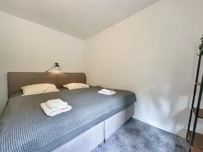 Ein Bett oder Betten in einem Zimmer der Unterkunft Königspfalzblick