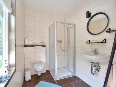 Ein Badezimmer in der Unterkunft Königspfalzblick