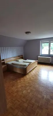Ein Bett oder Betten in einem Zimmer der Unterkunft Ferienwohnung Ella