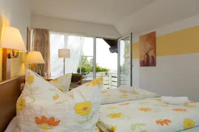 Ein Bett oder Betten in einem Zimmer der Unterkunft Hotel St Hubertus Wienrode
