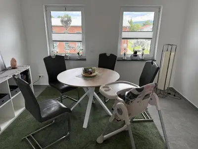 Ein Sitzbereich in der Unterkunft Ferienwohnung Am Teufelsmauerstieg