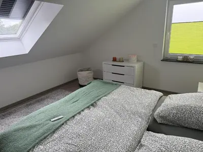 Ein Bett oder Betten in einem Zimmer der Unterkunft Ferienwohnung Am Teufelsmauerstieg