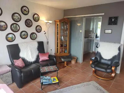 Ein Sitzbereich in der Unterkunft Ferienwohnung Schüler - Wolke 1