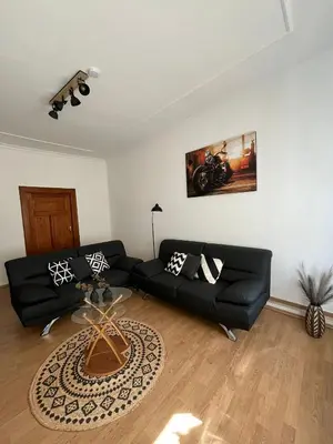 Ein Sitzbereich in der Unterkunft City-Apartment