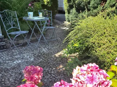 Ein Garten an der Unterkunft Kleines Wölkchen