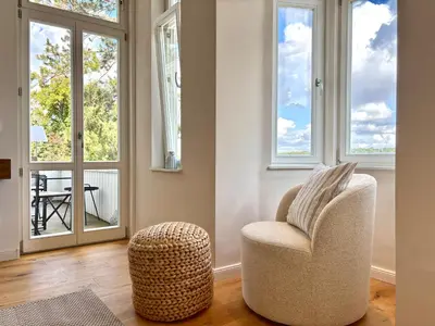 Ein Sitzbereich in der Unterkunft HyggeLiving - NEU - LUXUS - Villa - Bergblick - 3 Balkone - Parken - 100qm