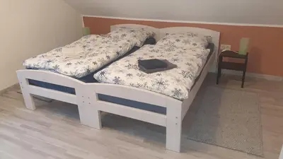 Ein Bett oder Betten in einem Zimmer der Unterkunft Erholungsoase am Rand des Harzes - Ferienwohnung