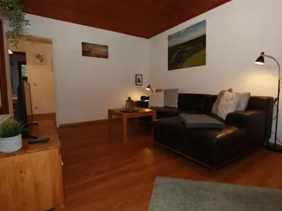 Ein Sitzbereich in der Unterkunft Ferienhaus in der Nähe des Sees, Haustierfrei