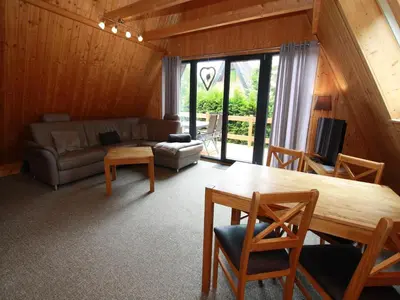 Ein Sitzbereich in der Unterkunft Ferienhaus für 5 Personen mit Garten