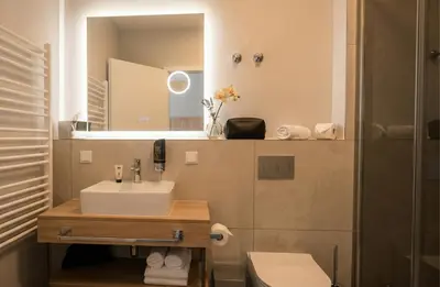 Ein Badezimmer in der Unterkunft H24 Parkhotel Thale