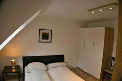 Ein Bett oder Betten in einem Zimmer der Unterkunft Tanne 16 - Bike & Familienurlaub in Braunlage