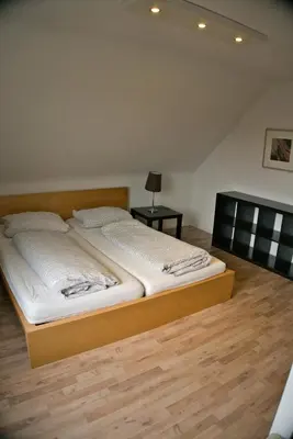 Ein Bett oder Betten in einem Zimmer der Unterkunft Tanne 16 - Bike & Familienurlaub in Braunlage