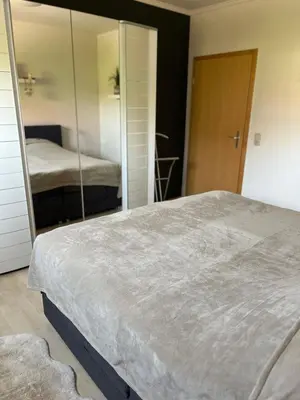 Ein Bett oder Betten in einem Zimmer der Unterkunft Ferienwohnung Brockenblick