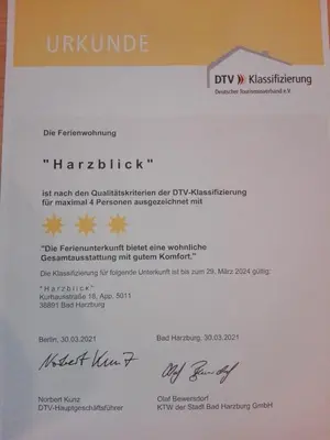 Ein Zertifikat, Auszeichnung, Logo oder anderes Dokument, das in der Unterkunft Fewo 3 Sterne Mit Harzblick ausgestellt ist