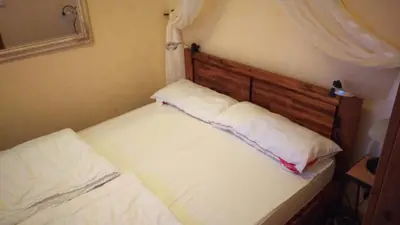 Ein Bett oder Betten in einem Zimmer der Unterkunft Ferienwohnung Mattejiet