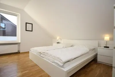 Ein Bett oder Betten in einem Zimmer der Unterkunft Ferienhaus Jennie