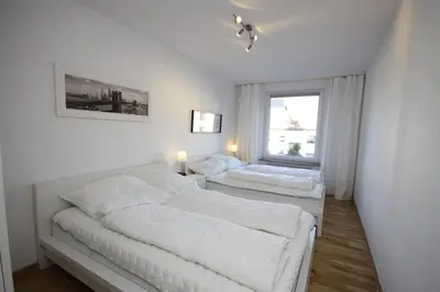 Ein Bett oder Betten in einem Zimmer der Unterkunft Ferienhaus Jennie