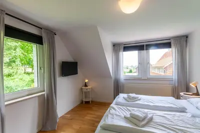 Ein Bett oder Betten in einem Zimmer der Unterkunft Ferienhaus Lars