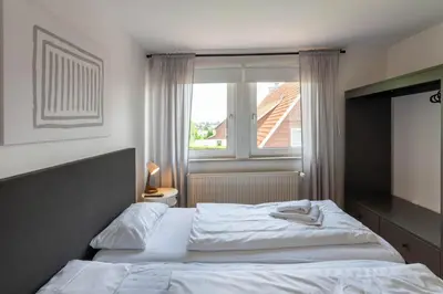 Ein Bett oder Betten in einem Zimmer der Unterkunft Ferienhaus Lars